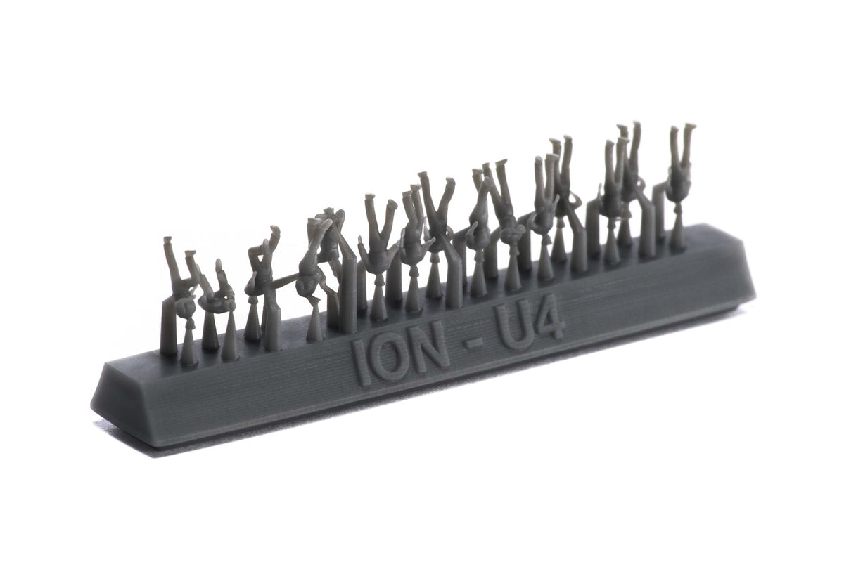Photo of finely detailed 1:350 scale US Navy WWII resin figures from ION Model, depicting chilling and active deck crew for warship model dioramas.