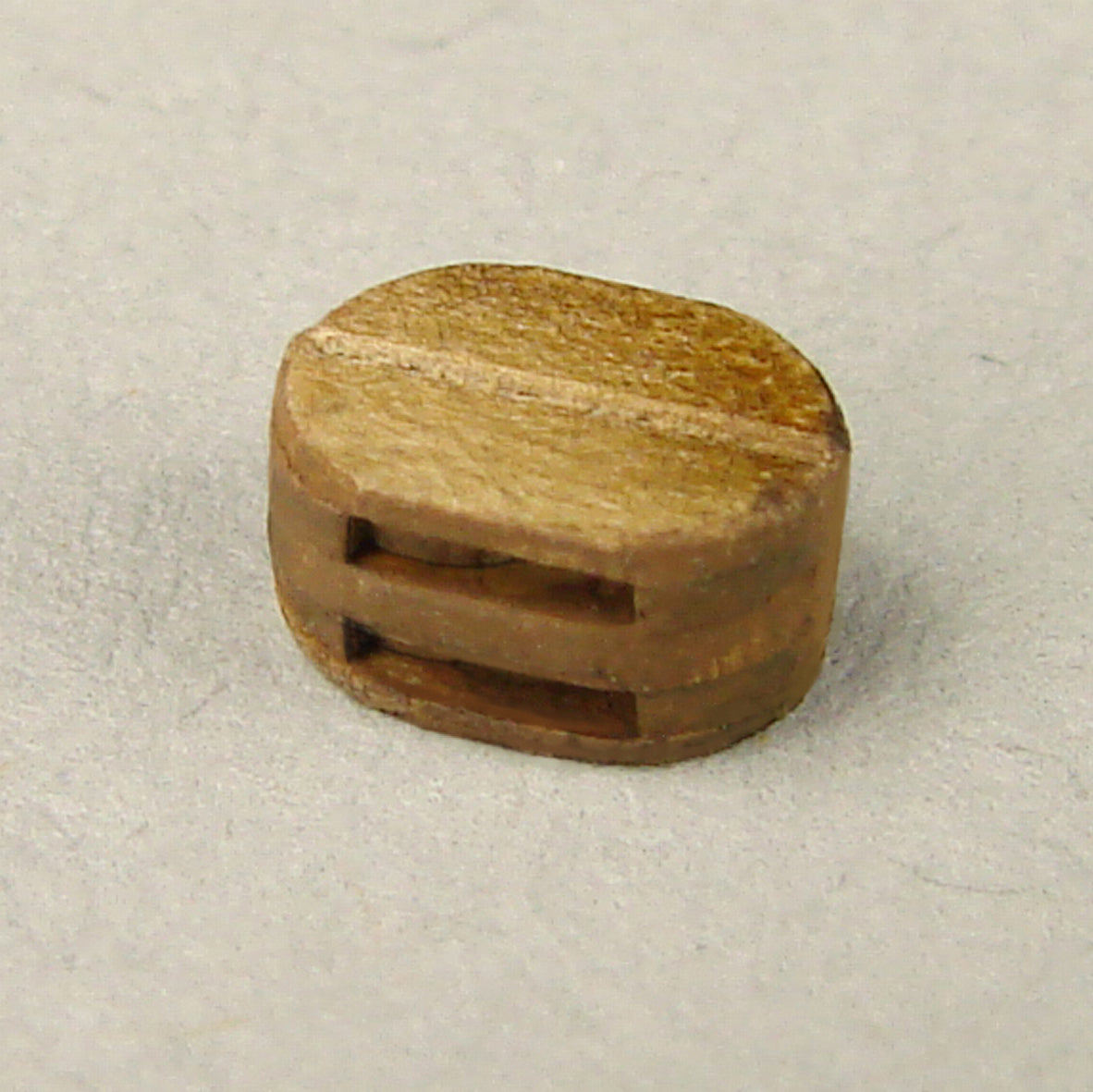 Image of Shipyard's 2mm Double Block Card, featuring a set of small, detailed blocks for DIY assembly, ideal for enhancing the rigging of scale model ships.
