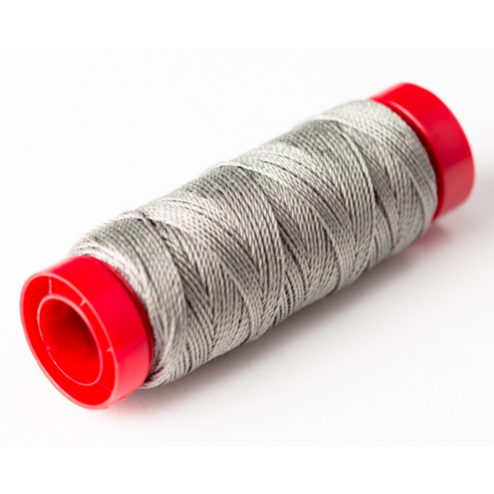 Photo of Amati B4127,06 gray rope, showing the texture and color detail on a white background.