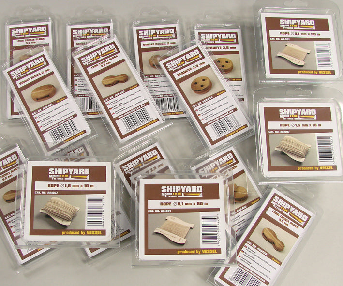 Image of Shipyard's Card Fitting Blocks, featuring small, detailed blocks for model ship assembly, perfect for adding intricate rigging details to scale models.