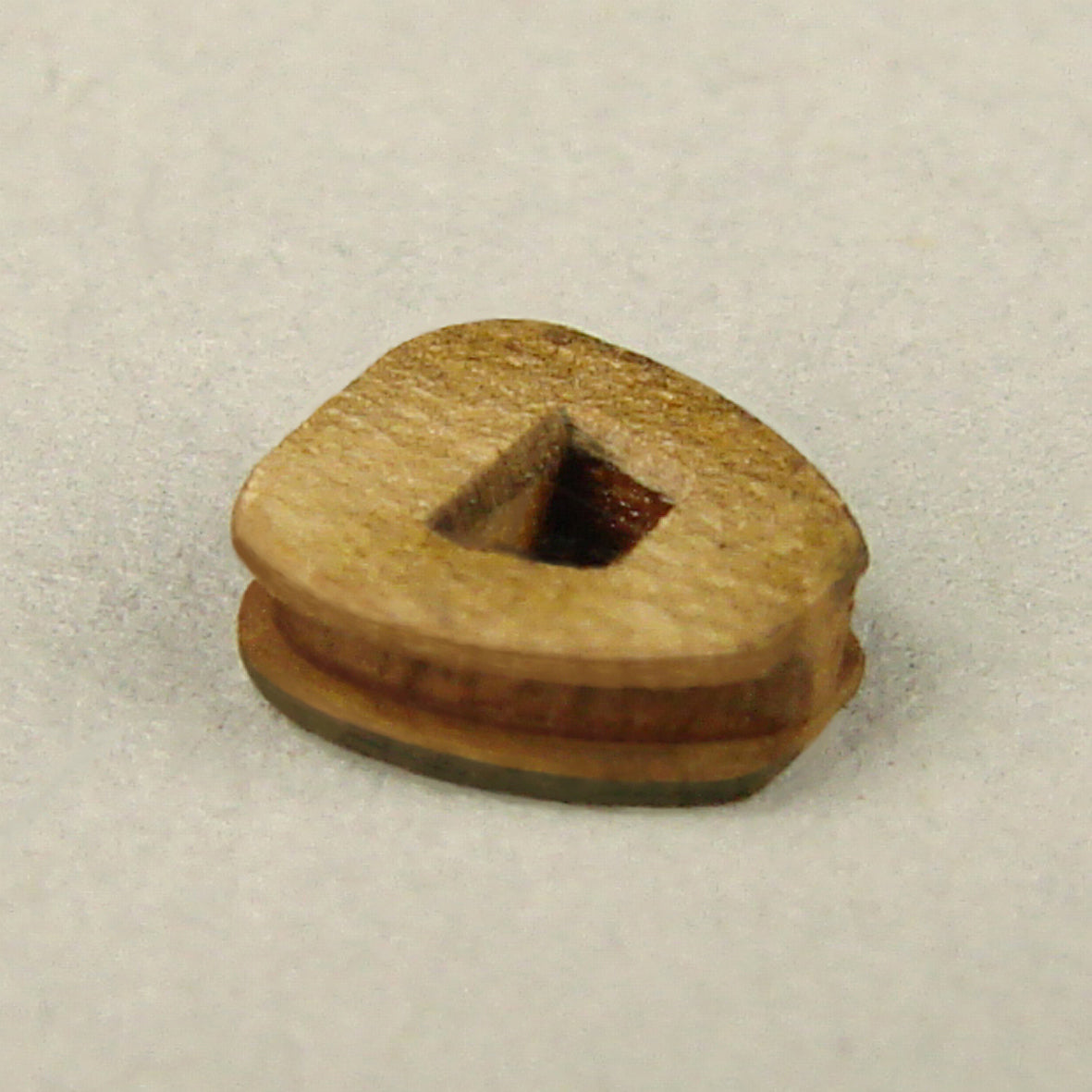 Photo of Shipyard's 2.5mm Heart Block Card Rigging Kit, showcasing precision-cut heart blocks for detailed model ship rigging.