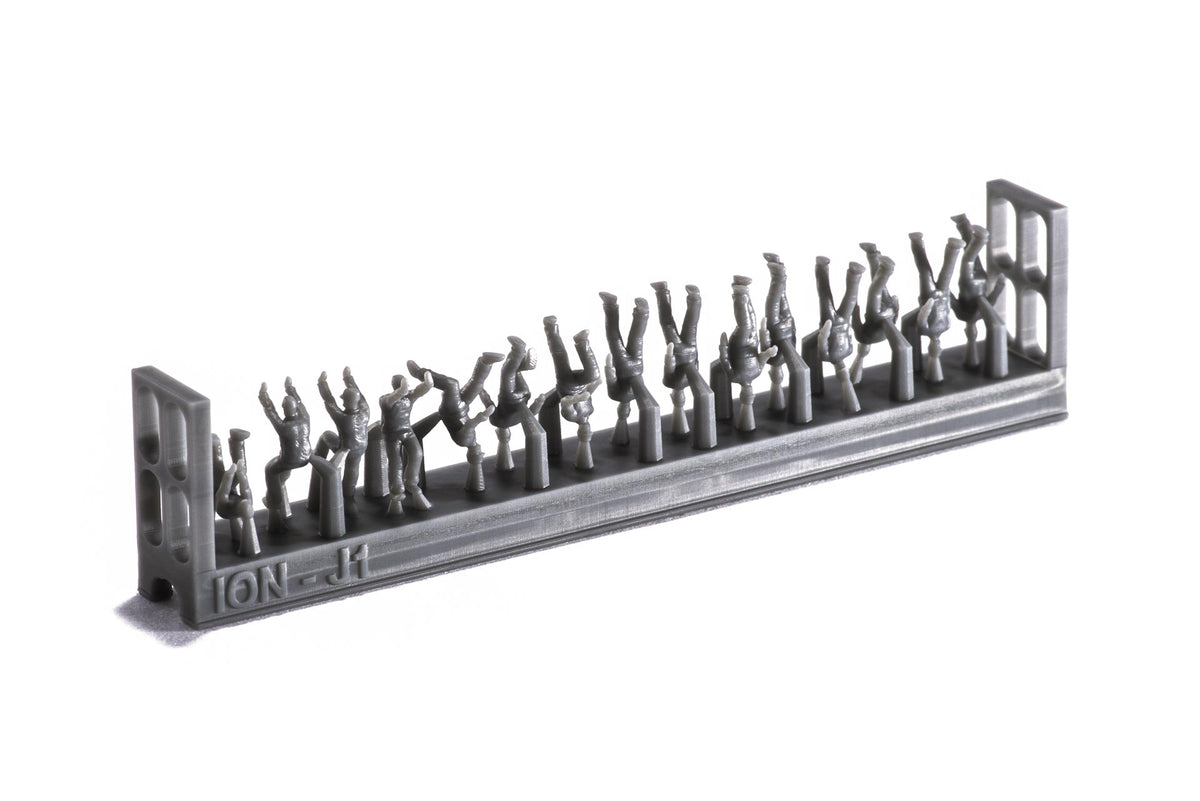Photo of finely detailed 1:200 scale Imperial Japanese Navy carrier personnel and pilots resin figures set by ION (J200-002), featuring 74 miniatures for ship model dioramas.