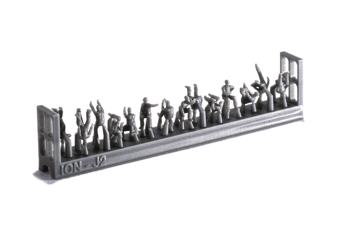 Photo of finely detailed 1:200 scale Imperial Japanese Navy carrier personnel and pilots resin figures set by ION (J200-002), featuring 74 miniatures for ship model dioramas.
