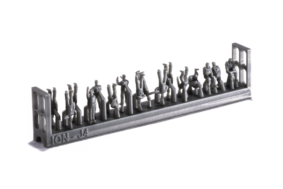 Photo of finely detailed 1:200 scale Imperial Japanese Navy carrier personnel and pilots resin figures set by ION (J200-002), featuring 74 miniatures for ship model dioramas.