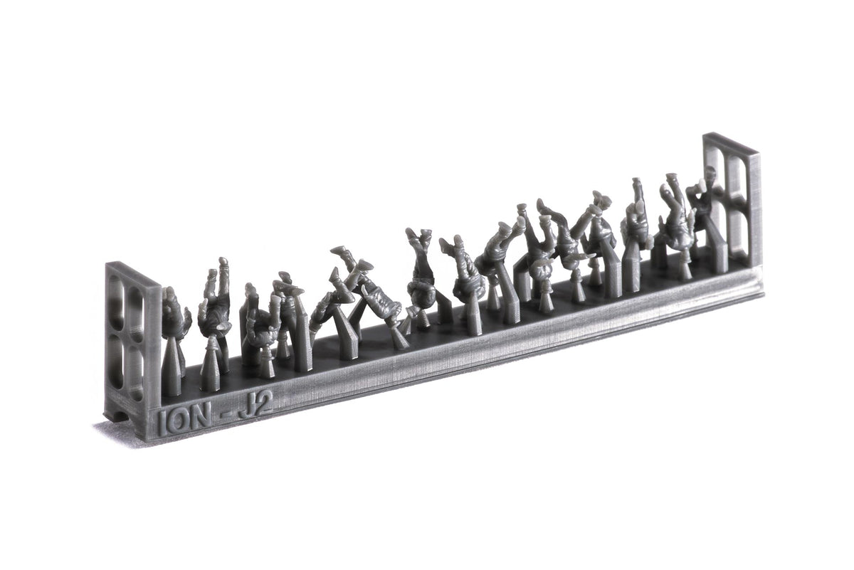 Photo of finely detailed 1:250 scale 3D-printed resin figures representing WWII Imperial Japanese Navy crew in various deck poses for model warships.