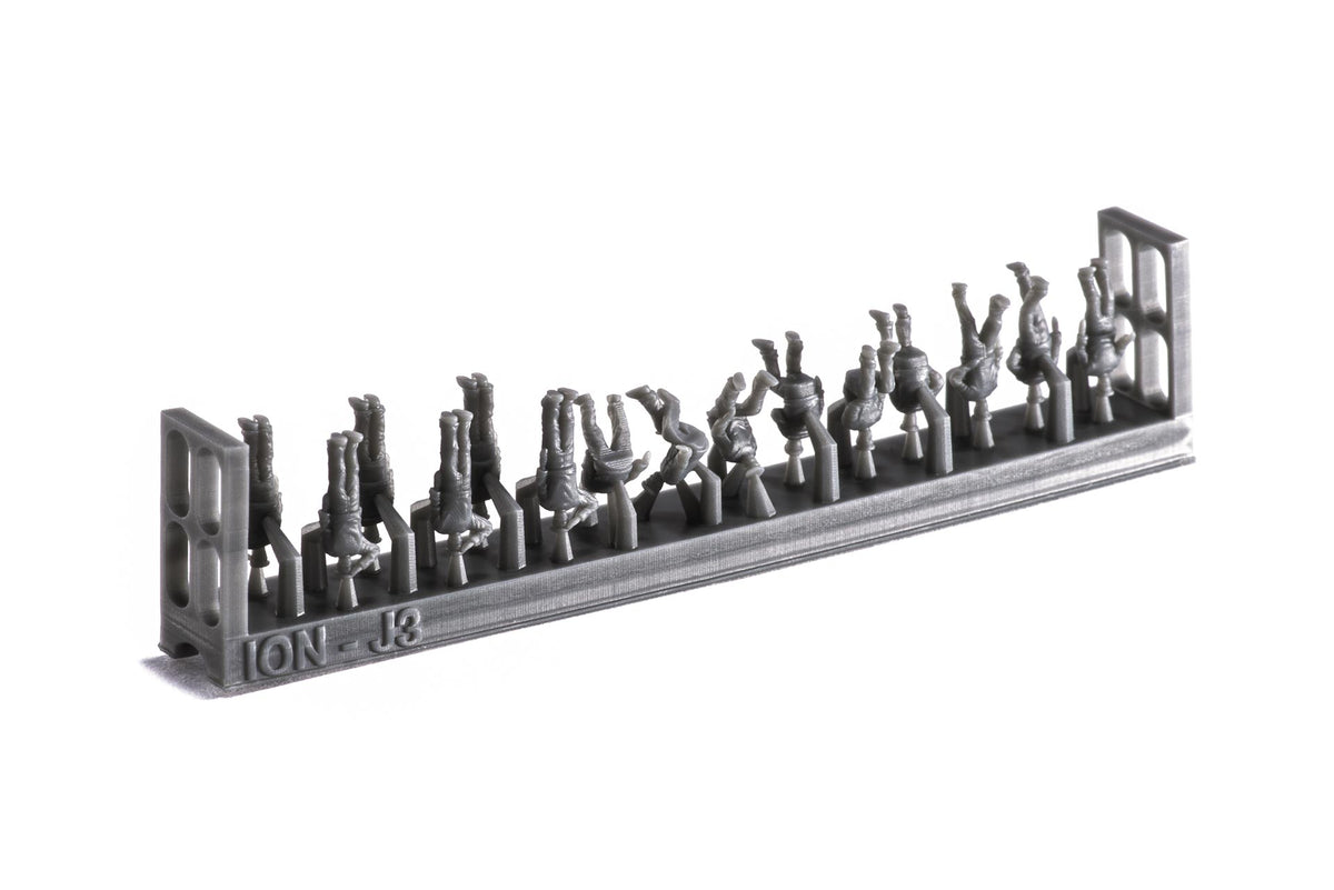 Photo of finely detailed 1:250 scale 3D-printed resin figures representing WWII Imperial Japanese Navy crew in various deck poses for model warships.