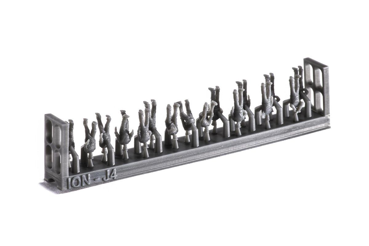 Photo of finely detailed 1:250 scale 3D-printed resin figures representing WWII Imperial Japanese Navy crew in various deck poses for model warships.