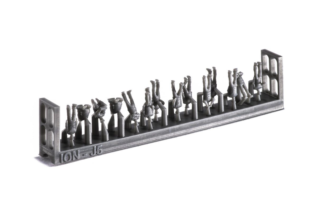 Photo of finely detailed 1:250 scale 3D-printed resin figures representing WWII Imperial Japanese Navy crew in various deck poses for model warships.