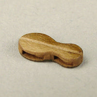 Photo of Shipyard's Long Tackle Block 4.5mm kit, showcasing the laser-cut card pieces for DIY assembly of detailed rigging blocks for model ships.