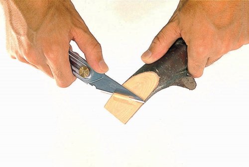 Photo of OLFA CK-2 Heavy-Duty Wood Carving Knife with stainless-steel body and extra-thick Kiridashi-style blade for precision wood carving.