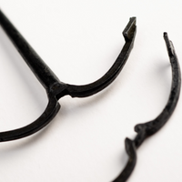 Image of Amati's 50mm Grapnel Anchor, displaying a meticulously crafted miniature replica with a traditional grapnel design, suitable for enhancing historical accuracy in model ships and nautical dioramas.