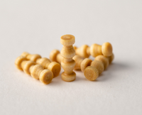 Image of Amati 7mm Wooden Turnbuckles, showcasing a set of finely crafted, detailed miniatures used for realistic rigging and structural enhancements in model shipbuilding and nautical dioramas.
