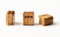 Image of Amati B4083,05 5mm Walnut Triple Blocks, featuring a set of 20 intricately crafted triple sheave blocks, ideal for detailed and advanced model ship rigging.