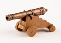 Image of Amati's B4155,40 40mm Cannon with Carriage, a highly detailed and historically accurate miniature perfect for model ship and diorama builders.