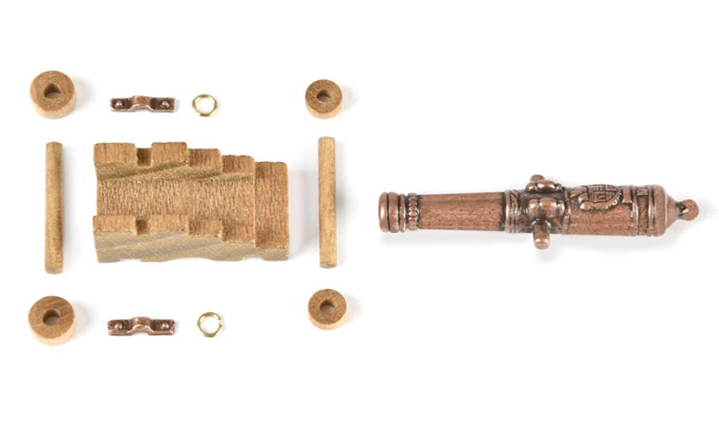 Image of Amati B4159,40 40mm Cannon with Wooden Carriage, showcasing a detailed and historically accurate miniature perfect for enhancing model ships and dioramas.