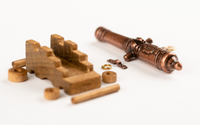 Image of Amati B4159,40 40mm Cannon with Wooden Carriage, showcasing a detailed and historically accurate miniature perfect for enhancing model ships and dioramas.