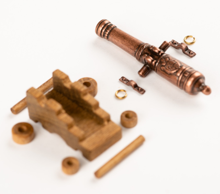 Image of Amati B4159,40 40mm Cannon with Wooden Carriage, showcasing a detailed and historically accurate miniature perfect for enhancing model ships and dioramas.