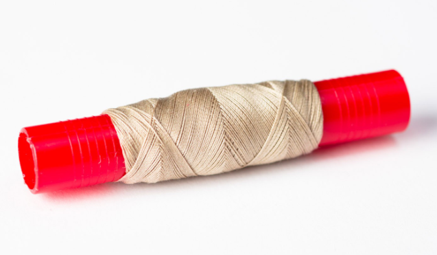 Photo of Amati B4124,05 high-quality model ship rope, 0.50mm diameter and 20m length, coiled neatly.