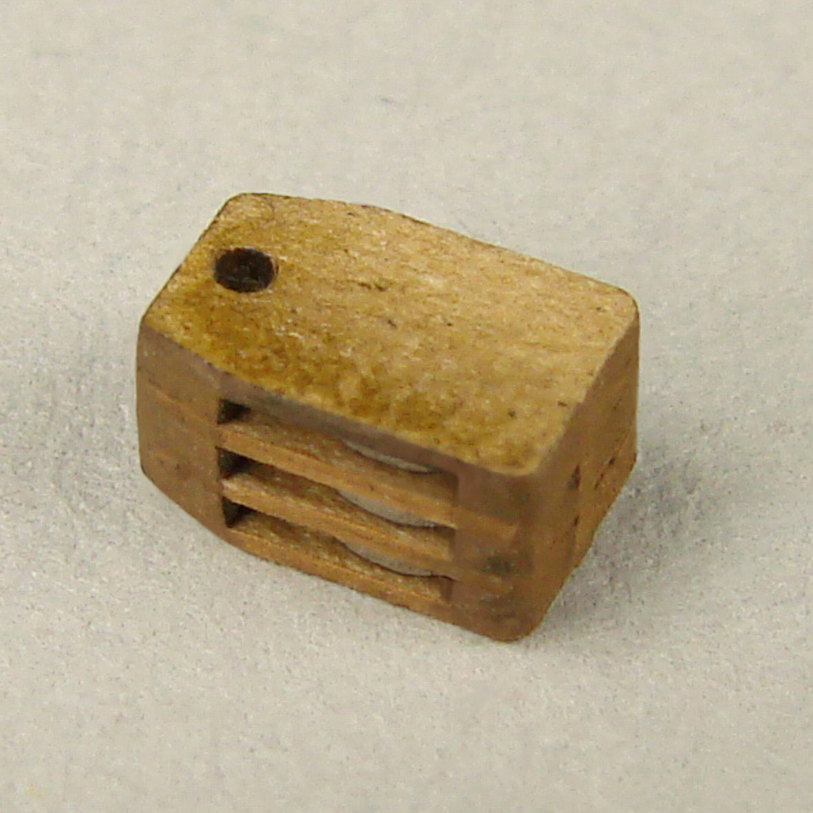 Image of Triple Ramshead 5.5mm Card Rigging Blocks by Shipyard, a set of 8, showcasing intricate details for model ship rigging enhancement.