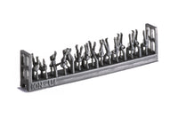 Photo of 74 finely detailed 3D-printed resin figures of US Navy WWII personnel in 1:250 scale, posed in active and relaxed positions for ship modeling.