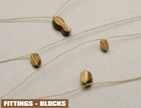 Image of Shipyard's Card Fitting Blocks, featuring small, detailed blocks for model ship assembly, perfect for adding intricate rigging details to scale models.