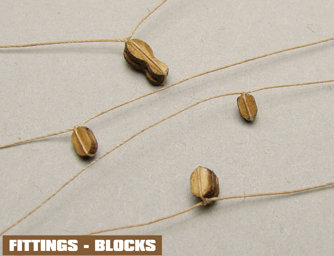 Image of Shipyard's Card Fitting Blocks, featuring small, detailed blocks for model ship assembly, perfect for adding intricate rigging details to scale models.