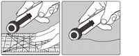 Photo of OLFA RTY-4 18mm Classic Straight Rotary Cutter with blade cover for safety storage, designed for precision cutting in sewing and crafting.