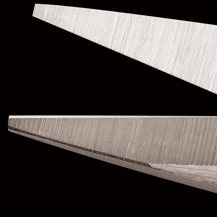 Photo of OLFA Precision Appliqué Scissors (OLF/SCS4) with stainless steel blades, ergonomic symmetrical handles, and sharp cutting edges.