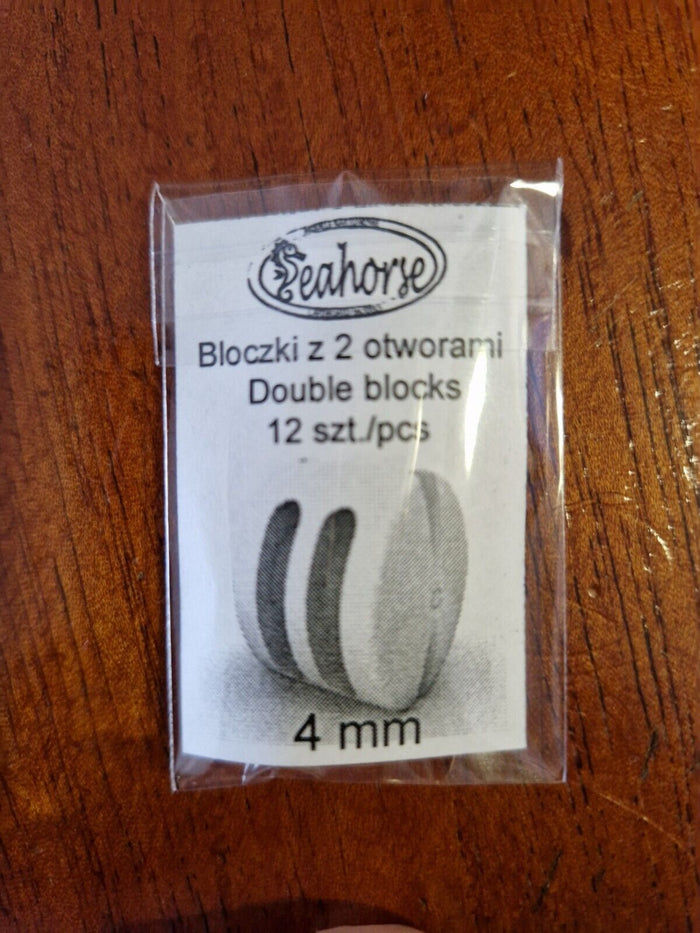 Image showcasing Seahorse's 12pcs of 4mm Double Blocks, 3D printed with high precision for detailed model ship rigging, highlighting their fine craftsmanship and accuracy.
