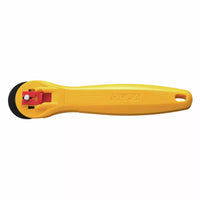 Photo of OLFA Quick-Change Rotary Cutter 28mm with ergonomic contoured handle and quick-change blade system, designed for precision cutting.