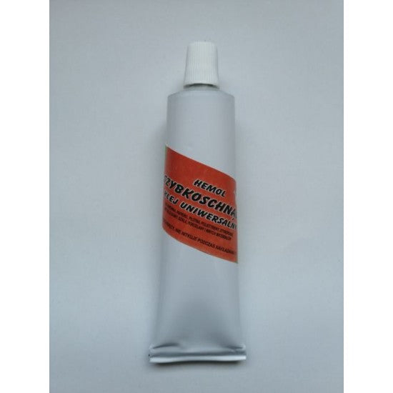 Image of Wamod Hemol Universal Adhesive 30ml bottle, showcasing its precision nozzle for versatile and strong bonding applications in crafting and modeling.