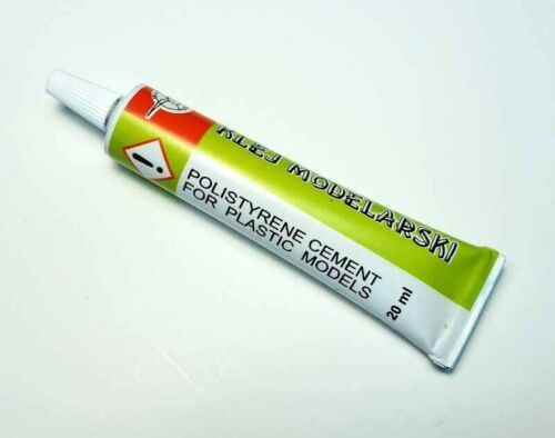 Image of Wamod 20ml Plastic Model Cement, showcasing the bottle and precision applicator for strong, durable bonding of plastic model parts.