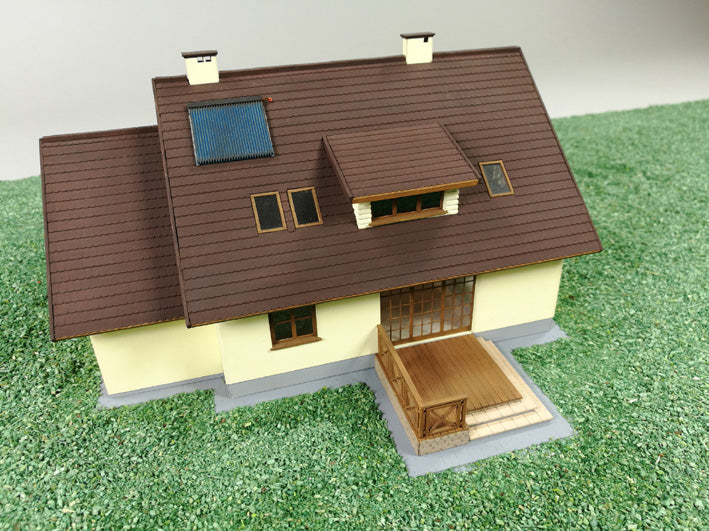 Photo of Olza Max Single-Family House 1:87 scale card model kit from Vessel Railway Miniatures, laser cut frame, perfect for HO dioramas