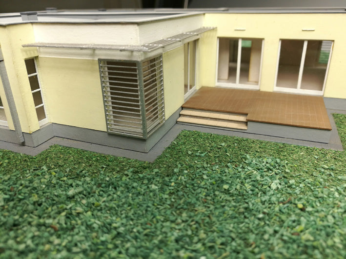 Photo of Opal Single-Family House 1:87 scale laser-cut card model kit by Vessel Railway Miniatures for HO scale railway dioramas