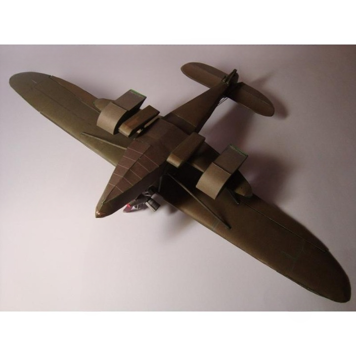 A detailed model of a vintage twin-engine propeller airplane, photographed from an elevated rear-three-quarter angle against a plain light background.