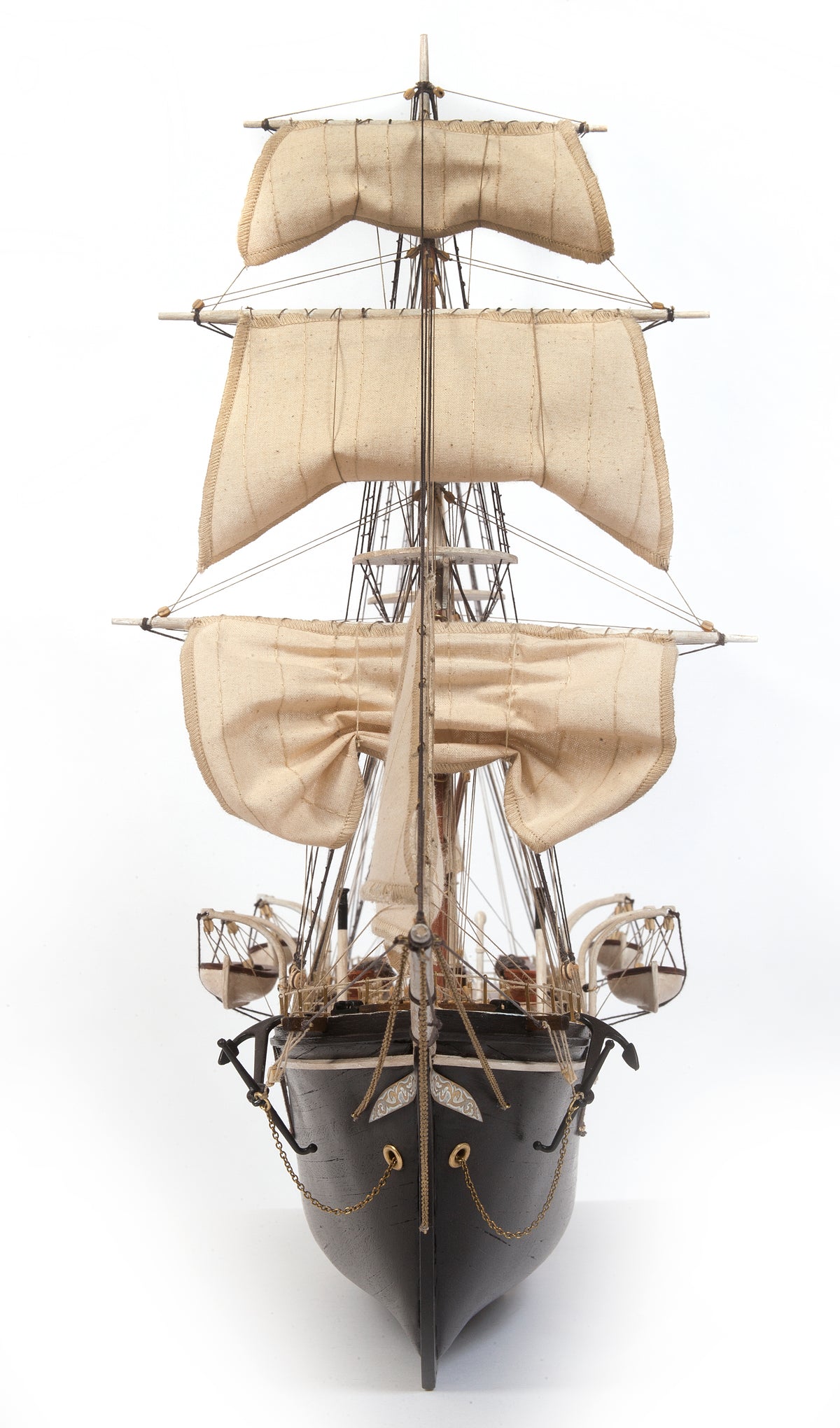 Photo of OcCre Endurance 1:70 wooden model ship kit with sails, nameplate, and detailed wooden construction