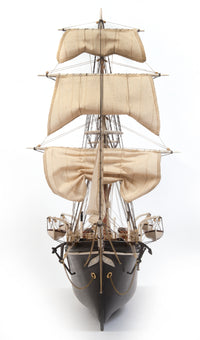 Photo of OcCre Endurance 1:70 wooden model ship kit with sails, nameplate, and detailed wooden construction