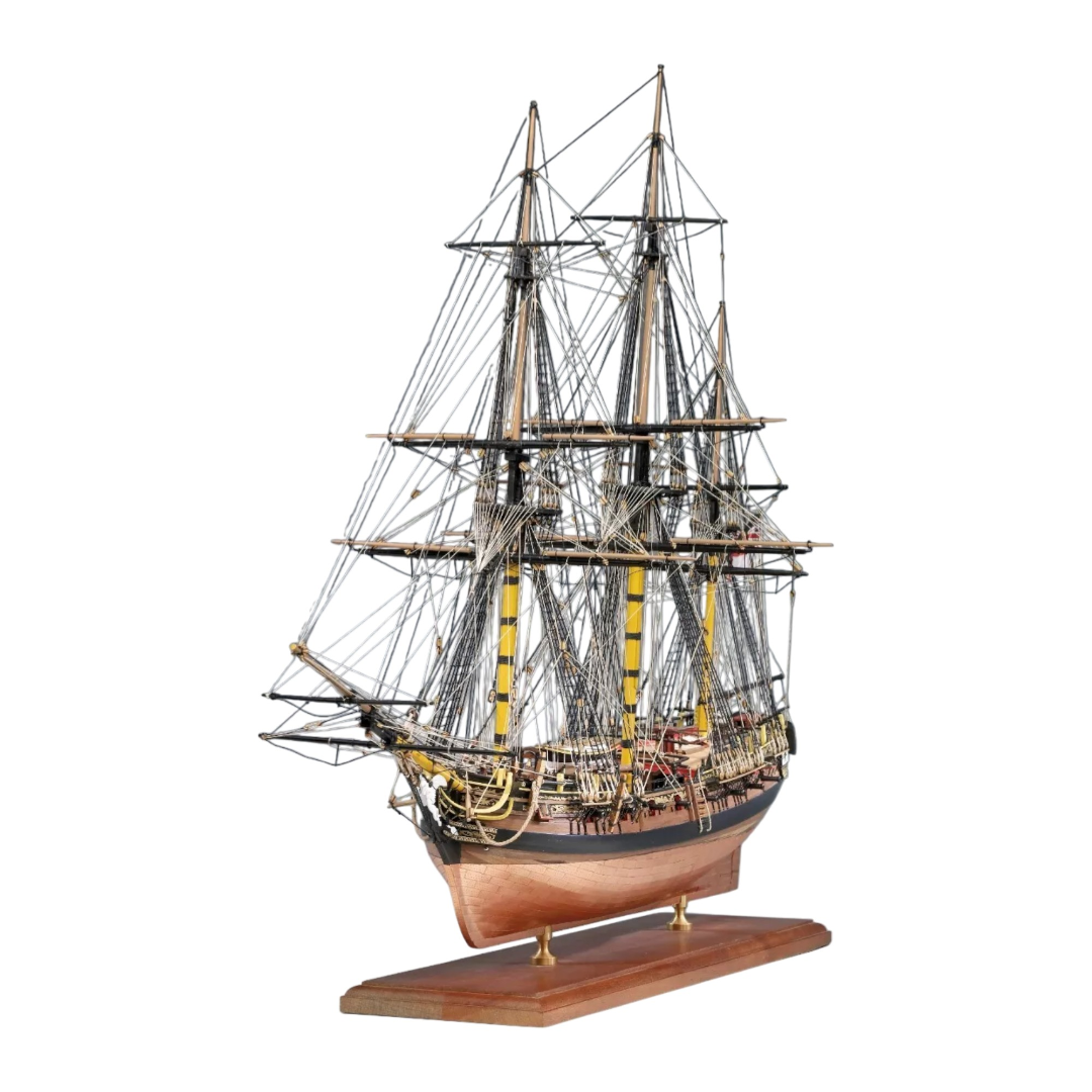 Photo of the Amati HMS Pegasus wooden model ship kit in 1:64 scale, showcasing premium materials and detailed components.