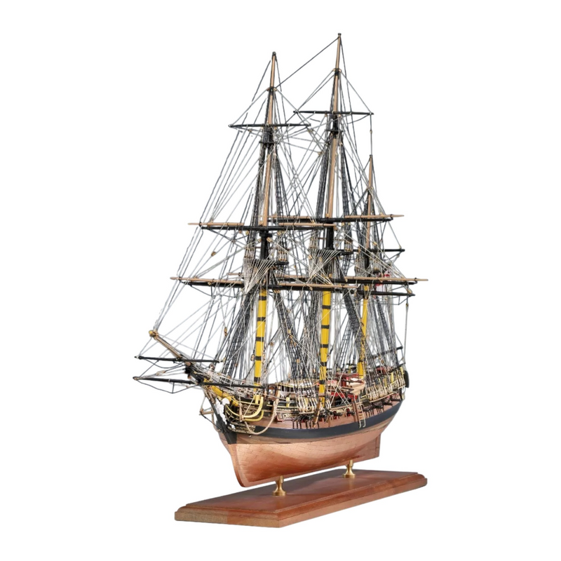 Photo of the Amati HMS Pegasus wooden model ship kit in 1:64 scale, showcasing premium materials and detailed components.