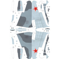 A flat layout sheet of decal pieces for an aircraft, featuring gray camouflage wing sections, red star insignias, and various smaller decals with printed part numbers on a white background.