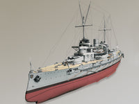 Photo of HMV S.M.S. Nassau paper model kit 1/250 scale battleship card model with detailed hull, turrets, and display stand