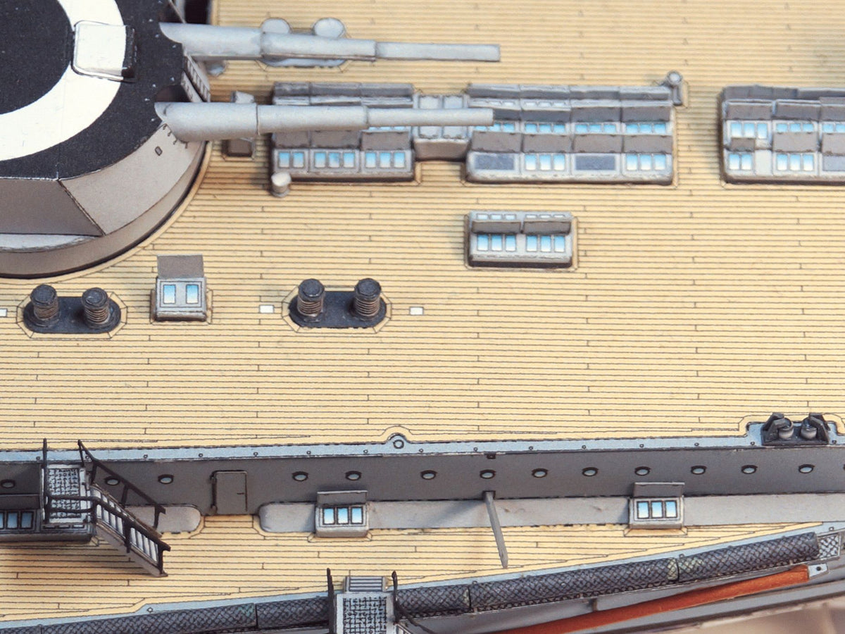 Photo of HMV S.M.S. Nassau paper model kit 1/250 scale battleship card model with detailed hull, turrets, and display stand