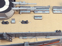 Photo of HMV S.M.S. Nassau paper model kit 1/250 scale battleship card model with detailed hull, turrets, and display stand