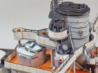 Photo of HMV S.M.S. Nassau paper model kit 1/250 scale battleship card model with detailed hull, turrets, and display stand