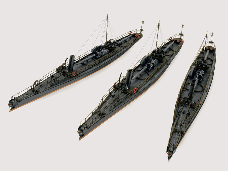 Photo of HMV Harbor Torpedo Boat S33–S35 card model kit in 1/250 scale with detailed paper parts and diorama pier.