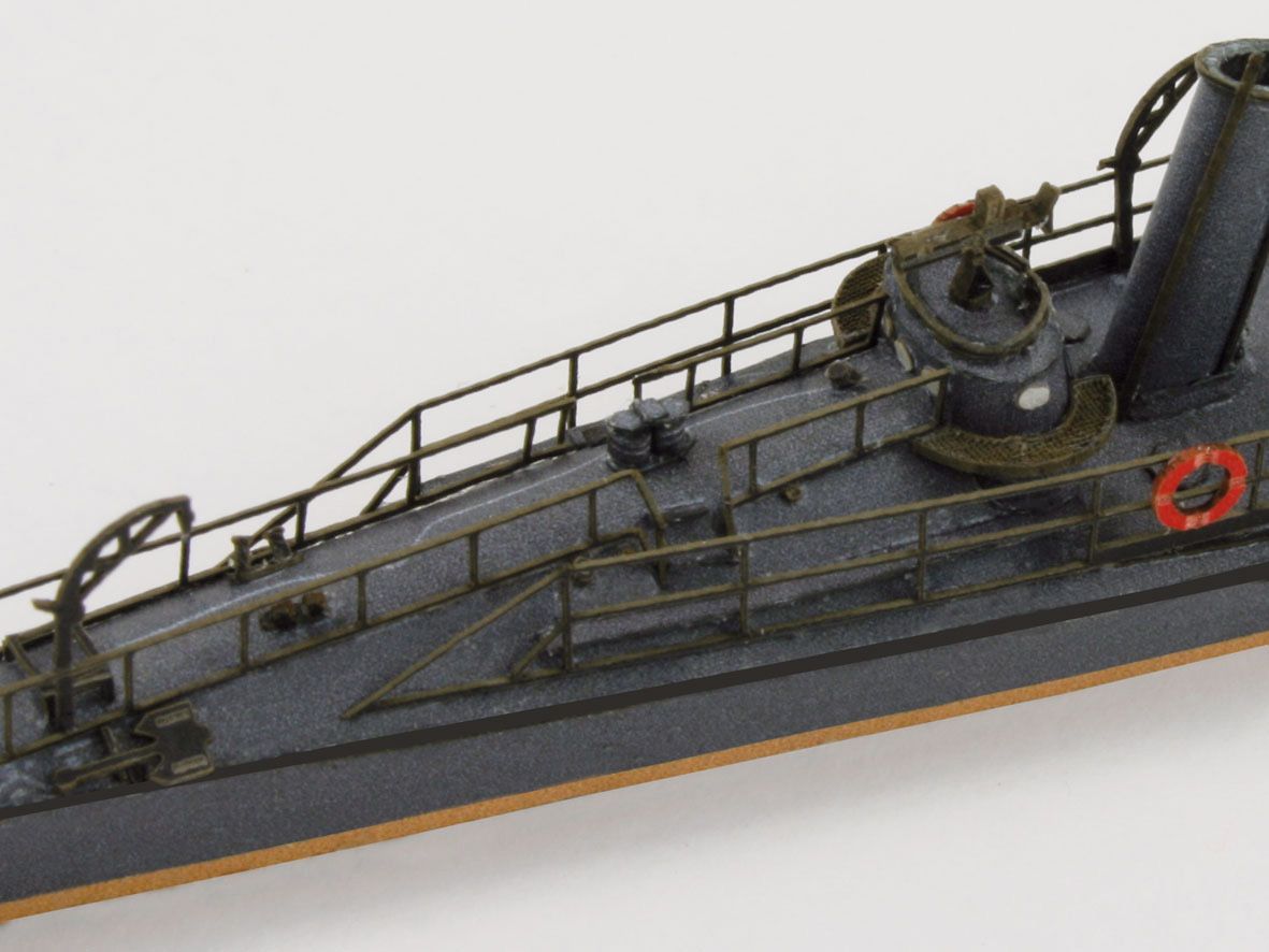 Photo of HMV Harbor Torpedo Boat S33–S35 card model kit in 1/250 scale with detailed paper parts and diorama pier.