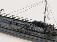 Photo of HMV Harbor Torpedo Boat S33–S35 card model kit in 1/250 scale with detailed paper parts and diorama pier.