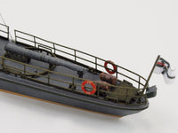 Photo of HMV Harbor Torpedo Boat S33–S35 card model kit in 1/250 scale with detailed paper parts and diorama pier.
