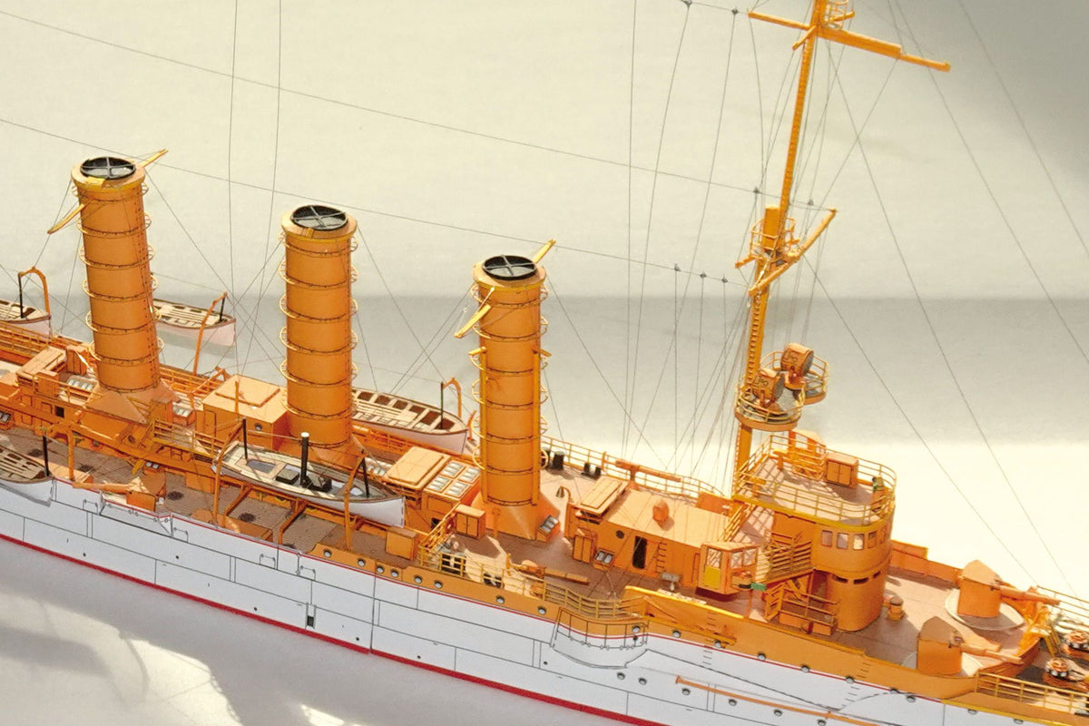 Photo of HMV SMS Emden 1/250 paper model kit – German light cruiser card model with detailed hull, bridge interior, and filigree masts.