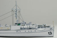Photo of HMV Harbor S-boat S7–S13 papermodel kit in 1/250 scale with two detailed ships and pier